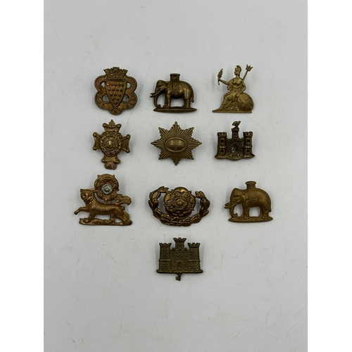 2242 - Ten military cap badges