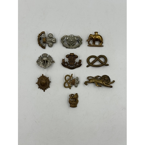 2243 - Ten military cap badges