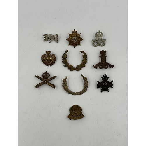 2249 - Ten military cap badges