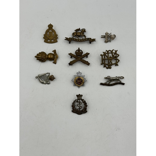 2250 - Ten military cap badges