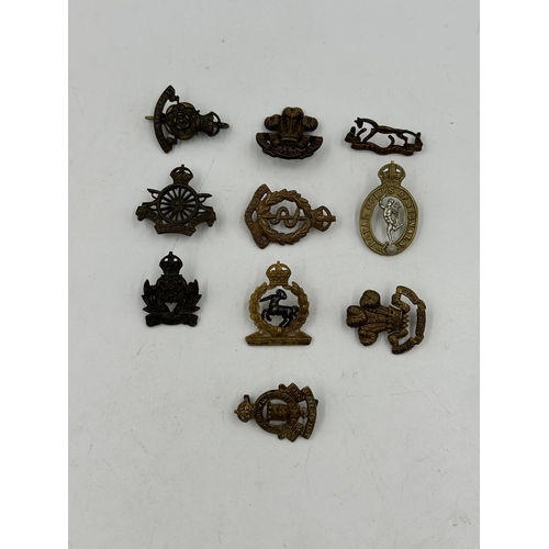 2251 - Ten military cap badges