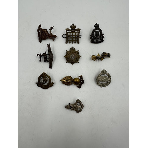 2252 - Ten military cap badges