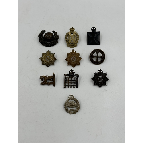 2255 - Ten military cap badges