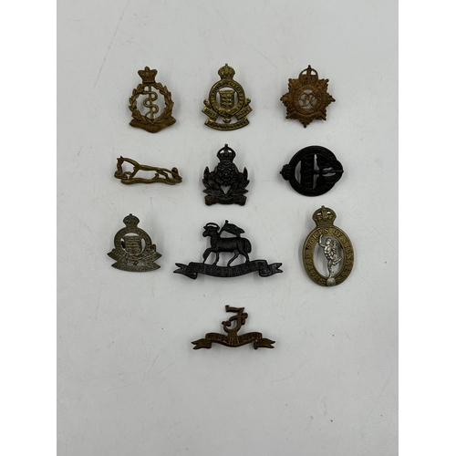 2257 - Ten military cap badges