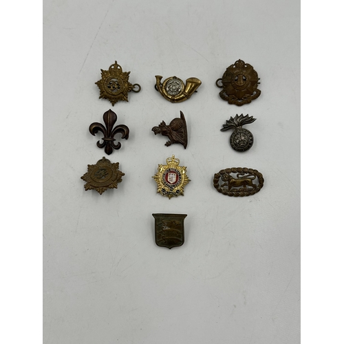 2258 - Ten military cap badges