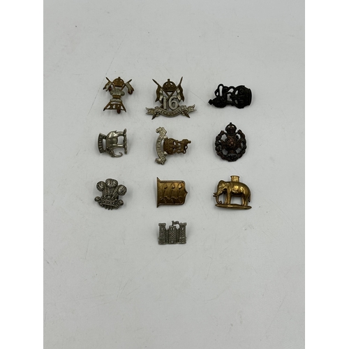 2259 - Ten military cap badges