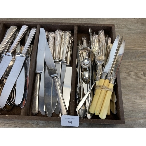 409 - A large collection of antique and later cutlery to include Kings pattern etc.