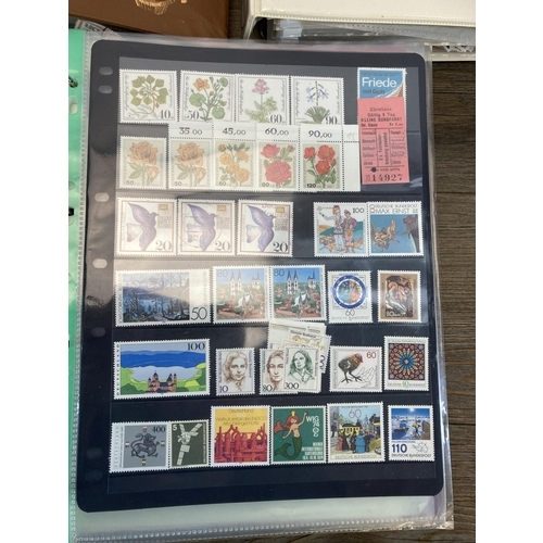 497 - Seven albums containing a large collection of worldwide stamps