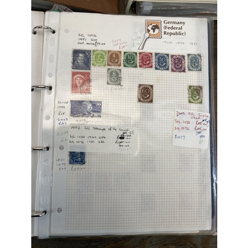 497 - Seven albums containing a large collection of worldwide stamps