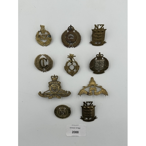 2088 - Ten military cap badges