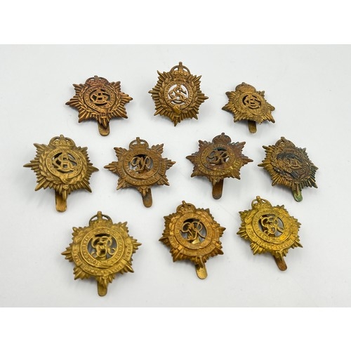 2094 - Ten military cap badges