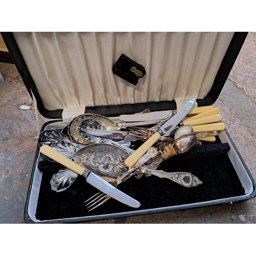 1040 - Two boxes containing cutlery, Brocklehurst Whiston Macclesfield silk, Disney Mickey Mouse figurine, ... 