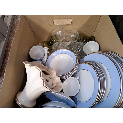 1044 - A box containing ceramics and glassware to include Royal Doulton etc.