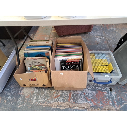 1048 - Three boxes containing vinyl records, cassettes etc.