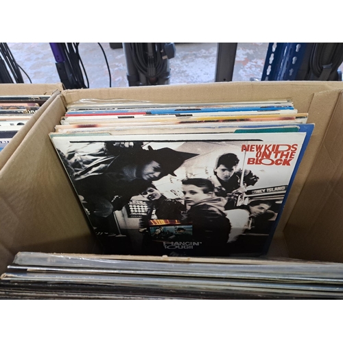 777 - Two boxes containing a collection of vinyl records to include Bob Dylan, Gary Moore, Eric Clapton, S... 