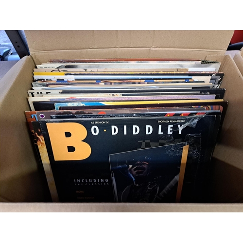 778 - Two boxes containing a collection of vinyl records to include Bo Diddley, Booker T. & the MG's, Eddy... 