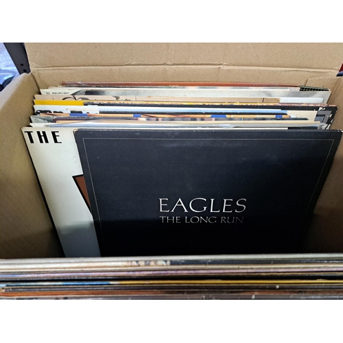 778 - Two boxes containing a collection of vinyl records to include Bo Diddley, Booker T. & the MG's, Eddy... 