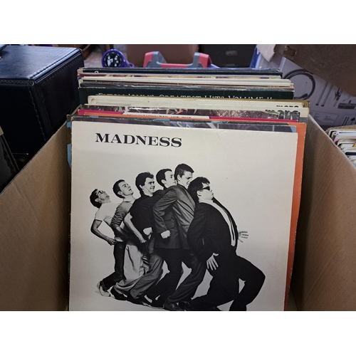 780 - Two record cases and one box containing The Beatles, The Who, David Bowie, Madness, The Police, Roxy... 