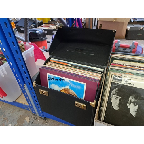 780 - Two record cases and one box containing The Beatles, The Who, David Bowie, Madness, The Police, Roxy... 