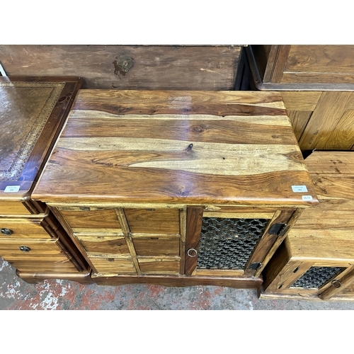 143 - An Indian sheesham wood stereo cabinet with six drawers - approx. 78cm high x 77cm wide x 49cm deep