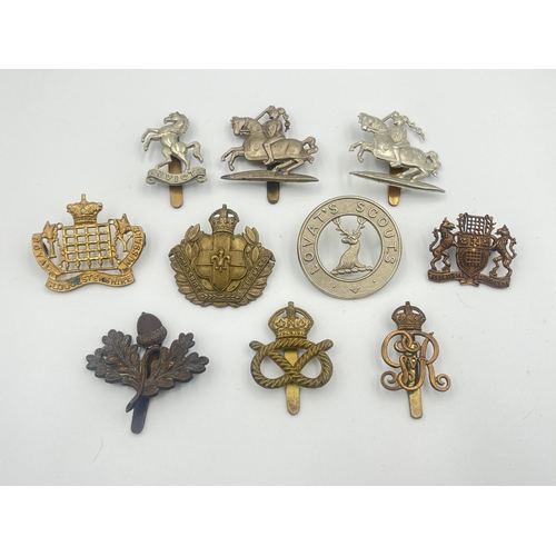 2003 - Ten military cap badges