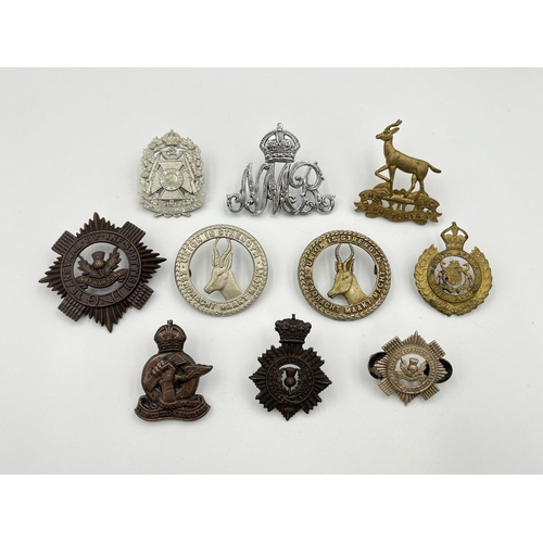 2010 - Ten military cap badges