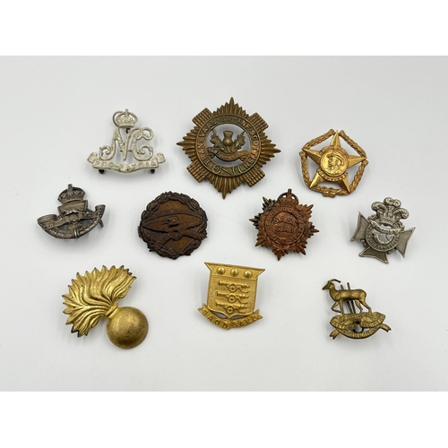 2012 - Ten military cap badges