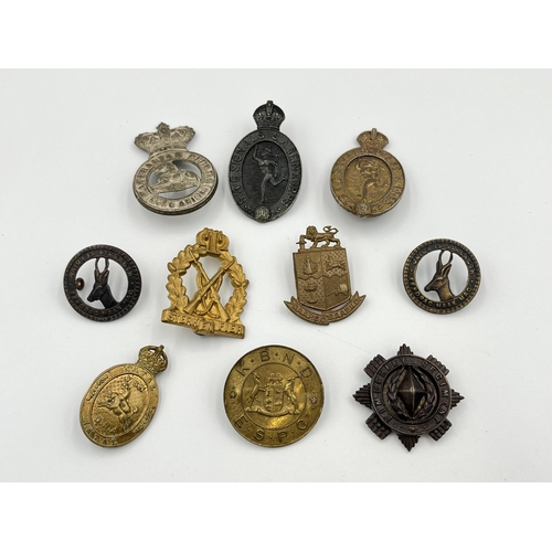 2013 - Ten military cap badges