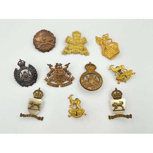 2021 - Ten military cap badges