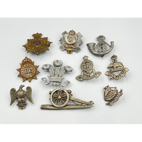 2030 - Ten military cap badges