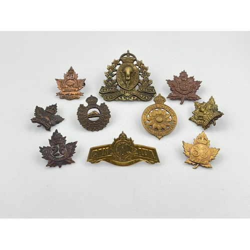 2031 - Ten military cap badges