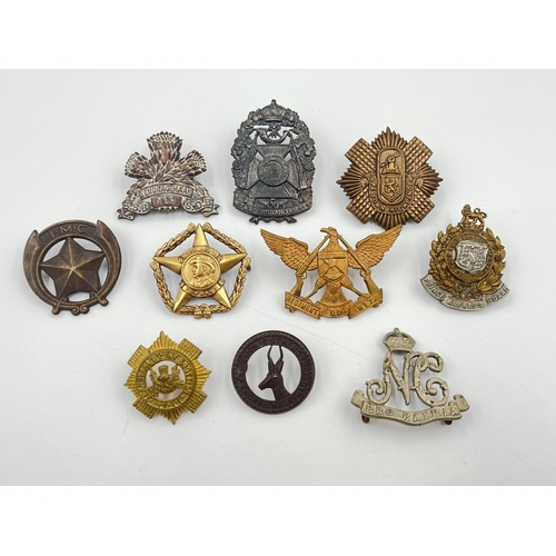 2038 - Ten military cap badges