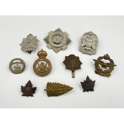 2050 - Ten military cap badges