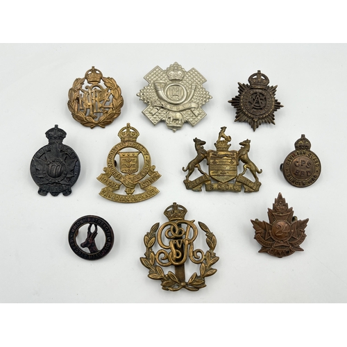 2062 - Ten military cap badges