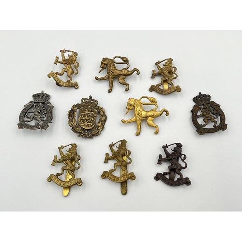 2070 - Ten military cap badges