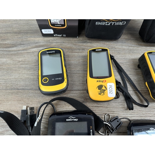 720 - Seven handheld navigation devices to include Garmin eTrex 10, Satmap Active 12 and Garmin eTrex Vent... 