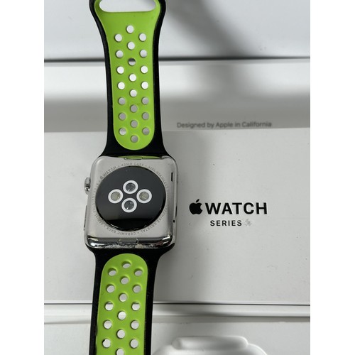 779 - A boxed Apple Watch series 2 stainless steel 42mm smart watch with six replacement straps