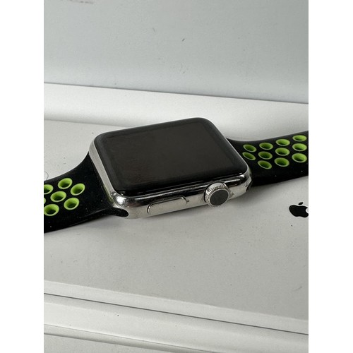 779 - A boxed Apple Watch series 2 stainless steel 42mm smart watch with six replacement straps