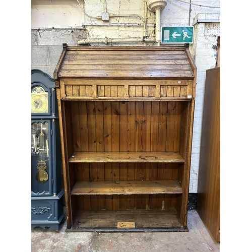 17 - A 19th century ecclesiastical pitch pine free standing bookcase - approx. 208cm high x 137cm wide x ... 