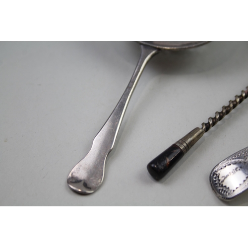 2249 - Three silver items to include sterling sugar sifter, sterling tea strainer etc. - approx. gross weig... 