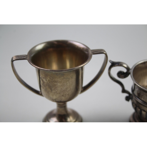 2250 - Two .925 sterling silver trophies - approx. gross weight 61.3g