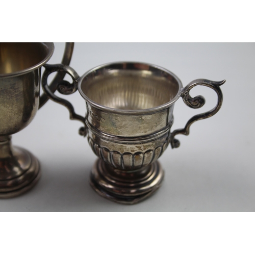 2250 - Two .925 sterling silver trophies - approx. gross weight 61.3g