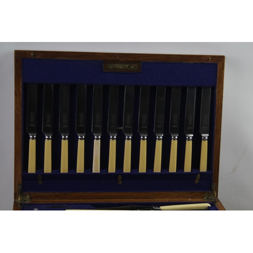 433 - A cased Scott & Sons Sheffield 82 piece cutlery set