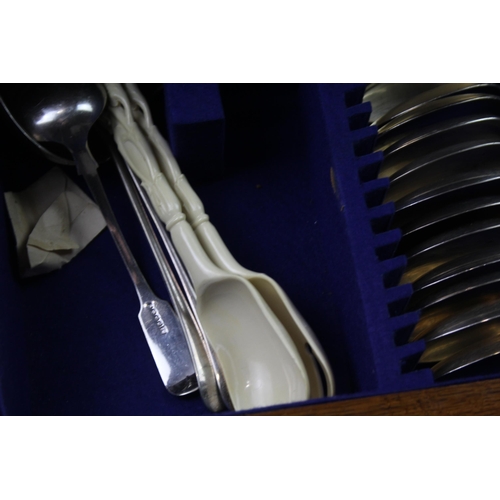 433 - A cased Scott & Sons Sheffield 82 piece cutlery set