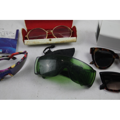 478 - A collection of assorted sunglasses