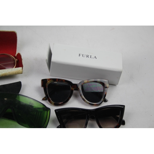 478 - A collection of assorted sunglasses