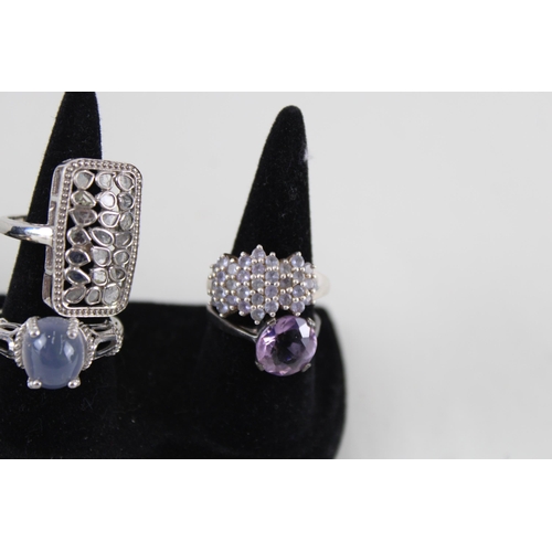 2290 - Eight silver gemstone set rings - approx. gross weight 36g