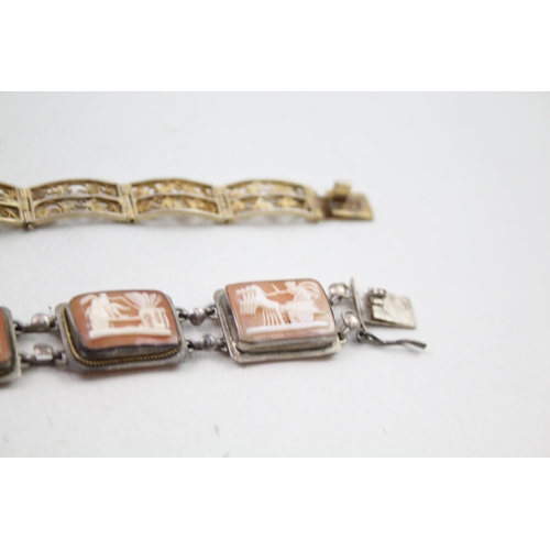 2309 - Two silver shell cameo bracelets - approx. gross weight 32g