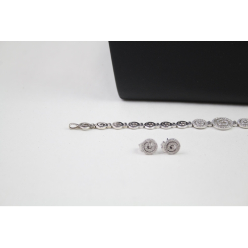 2318 - A .925 silver necklace, bracelet, pendant and earrings set - approx. gross weight 33g