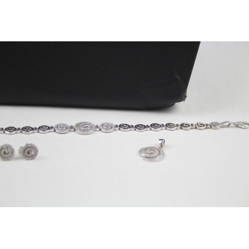 2318 - A .925 silver necklace, bracelet, pendant and earrings set - approx. gross weight 33g